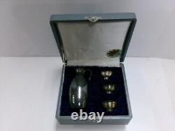 Japanese Sake. One Sterling Silver decanter and three silver cups. #118g/ 4.15oz
