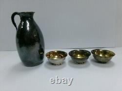 Japanese Sake. One Sterling Silver decanter and three silver cups. #118g/ 4.15oz